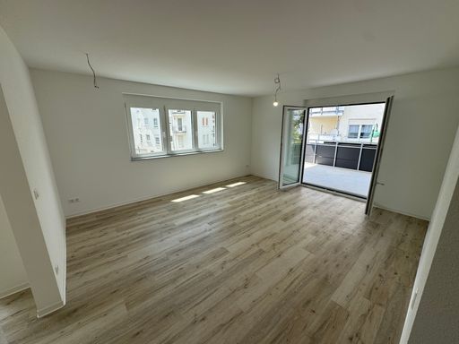 Wohnzimmer mit Balkon